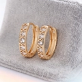 Pair of gold-plated hoop earrings with micro-pave round zircons on grey velvet base - Gold