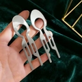 Close-up of dual silver minimalist U-shaped hairpins with sleek geometric hollow design - Silver (2PCS Set)