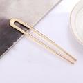 Elegant U-shaped gold alloy hair pin with polished finish for classic hair styling - Gold Shiny Style