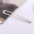 Polished silver U-shaped hair pin with a sleek double-prong design for elegant buns - Silver Smooth Style