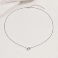 Detailed macro view of silver smiley face pendant with O-chain and lobster clasp closure - Silver Style (C7408)