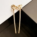 Eleganter goldener U-förmiger Haarnadel mit stilvollem hohlem Schleifendesign auf Kontrast - KC Gold (E4117)