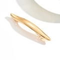 Polished gold curved spring hair clip with a smooth metallic finish on white display - Wave / Gold