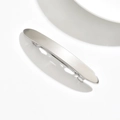 Macro view of long slim silver metal hair clip with a minimalist matte brushed finish - Marquise / Silver