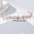 Eleganter Brautkronen-Haarreif in Roségold mit funkelnden Kristall-Schneeflocken - Strass Blumenstil / Strass Roségold