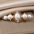 Elegant gold flower pearl hair clip with sparkling rhinestones in a baroque vintage style - Gold