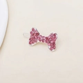 Barrette à cheveux forme d'os scintillante avec strass roses et finition métal argenté - Nœud Papillon Diamant Rose