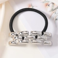 Minimalist silver metal hair tie with woven texture and elastic black band - Silver