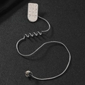 Collana vintage con quadrante telefonico e catena a spirale su sfondo nero opaco - Argento