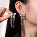 Elegant butterfly tassel earrings with sparkling rhinestones and silver-tone chains - Silver (As Shown)