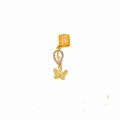 Macro shot of gold butterfly hair ring with zircon-inlaid leaf pendant for braids - Leaf Style