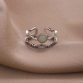 Dettaglio anello a onde a due strati con pietra occhio di gatto verde e zirconi pavé - Aperto Regolabile / Pietra Verde Chiaro Argento