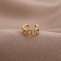 Minimalist gold heart-shaped hollow ring with elegant polished finish on fabric - Gold Style (D9314)