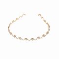 Elegant gold wavy headband with delicate rhinestone accents for women in minimalist style - Gold