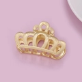 Elegant gold hollow crown metal hair claw clip for women on a soft pink background - Crown Gold (E5506)