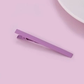 Matte purple alligator hair clip on pink background with minimalist metal design - Purple