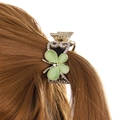 Elegante fermaglio per capelli a farfalla dorato con opale verde e strass sui capelli - Farfalla Occhio di Gatto Verde