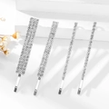 Lot de quatre barrettes à cheveux en métal argenté avec strass brillants style chic - Ensemble Argent