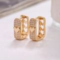 Elegant gold U-shaped hoop earrings with sparkling zircon heart accents and cutouts - Gold