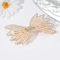 Elegante fermaglio per capelli a fiocco dorato con perle bianche e strass lucidi - Stile Papillon con Perla B8104
