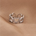 Macro detail of silver adjustable ring featuring multiple heart-shaped crystal links - Silver (L7416)