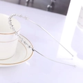 Cerchietto argento con stelle, lune e piccole perle sintetiche eleganti - Argento