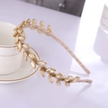 Elegant gold olive branch headband with champagne leaf crystals and rhinestone details - Champagne
