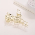 Eleganter Tulpen-Haarclip aus goldfarbenem Metall mit minimalistischem Ausschnitt-Design - Gold