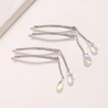 Set of four silver metal hair clips with zircon water drop pendants and thin chains - Silver