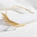 Elegant gold metal leaf headband with detailed mesh texture on minimalist white display - Gold