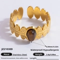 Adjustable golden stainless steel ring featuring an oval dark brown natural stone - Tiger Eye Leaf Textured Style (JZ21030D)