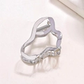 Macro shot of silver liquid-shaped metal hair claw showing wavy texture and spring - Silver (D5137)