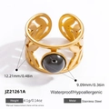 Golden stainless steel ring with black sphere bead and hollow leaf pattern details - Black Ball Hollow Leaf Style (JZ21261A)