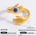 Golden stainless steel hug ring with blue stone and sunburst pattern detail - Blue Gemstone Hugging Palms Style (JZ21072D)