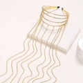 Elegante cerchietto multistrato dorato con strass e nappe lunghe per capelli da donna - Quattro Strati Oro