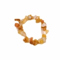 Macro detail of elastic bracelet with irregular yellow natural quartz stone beads - Champagne