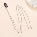 Detail van zilveren ster en maan haarketting met zwarte haarspeld voor haarstyling decor - Zilver (C5423)