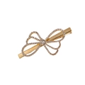 Elegant gold bow hair clip featuring sparkling rhinestones and a central crystal detail - Gold