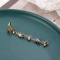 Detail of gold metal spiral clip and long natural spotted stone chain hair accessory - Leopard Print Short Style (E9412)