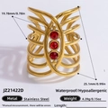 Gold-plated layered stainless steel ring featuring three vibrant red round gemstones - Three Red Ruby Wave Hollow Style (JZ21422D)
