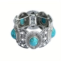 Macro shot of bohemian stretch bracelet with turquoise stones and vintage floral carvings - Oval Turquoise Elastic Bracelet