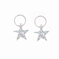 Detailed close-up of Y2K style star-shaped pendants with silver glitter for hair rings - White Pair