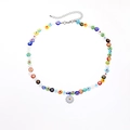 Close-up of colorful glass beads and enamel daisy pendant on a stainless steel necklace - Daisy Style Lampwork Necklace