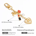Portachiavi in acciaio inossidabile dorato con rossetto, cuore e perle bianche - Stile Cuore Trucco (BL010005)