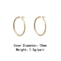 Detailed view of 10mm inner diameter gold round hoop earrings weighing 1.5g per pair - Gold (10mm Inner Diameter)