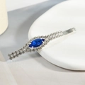 Elegant silver hair clip with a marquise blue crystal and white rhinestones - Single Blue Navette (E8506)