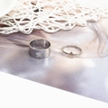 Detail of adjustable vintage silver couple rings with hollow star and solid star designs - Star Silver (J6403)