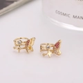 Elegant gold butterfly and star ear cuff with sparkling red and white cubic zirconia - Gold