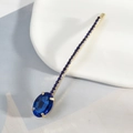 Elegante fermaglio per capelli dorato con una grande gemma blu ovale e strass scintillanti - Blu (B5205)