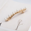 Elegante pasador dorado con diez perlas blancas degradadas dispuestas en una línea curva - Dorado (B3127)